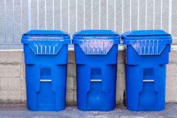 set of recycling bins