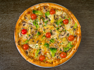 Pizza With Broccoli Cheese And Cherry Tomatoes