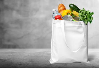 Full shopping  bag on desk