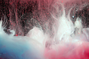 Acrylic colors in water. Ink blot. Abstract background.