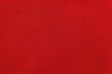red rip stop strong and durable material of lasting touristic equipment and sportswear