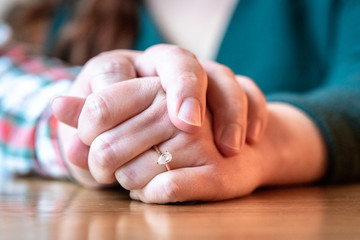 Couple holding hands