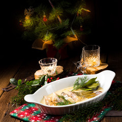 fried christmas carp in butter sauce with dill and lemon