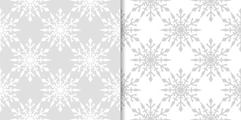 Snowflakes. Seamless patterns. Gray and white winter ornaments
