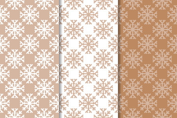 Snowflakes. Seamless patterns. Set of beige winter ornaments