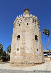 Fototapeta na wymiar Torre del Oro or Golden Tower (13th century), a medieval Arabic military dodecagonal watchtower in Seville, Andalusia, southern Spain
