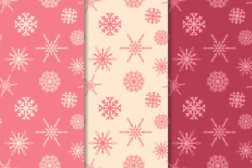 Snowflakes. Seamless patterns. Cherry red and beige winter ornaments