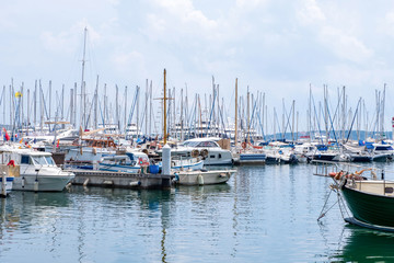 Fototapeta na wymiar Lots of boats in the sea port of Cannes