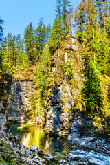 Fototapeta na wymiar The Coquihalla River before it flows through Coquihalla Canyon Provincial Park and past the Othello Tunnels of the old Kettle Valley Railway near the town of Hope, British Columbia, Canada 