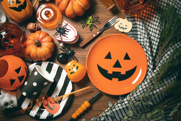 halloween holiday dinner prop decoration with wood table background