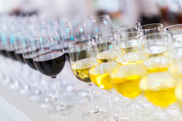 Glasses with white and red wine