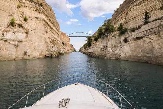 Passing through the Corinth Canal on a yacht from the Saronic Gulf, Aegean Sea to the Corinth Gulf, Ionian Sea.