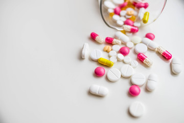 Drug prescription for treatment medication. Pharmaceutical medicament, cure in container for health. Pharmacy theme, capsule pills with medicine antibiotic in packages.