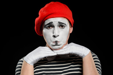 Portrait of sad male mime