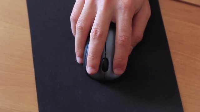 wireless mouse on the computer mat