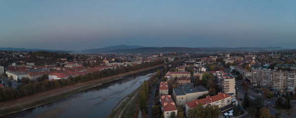 Obraz premium Drone aerial view on the residential area in river Uzh the Uzhgorod Zakarpattya Ukraine