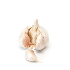 Raw garlic on white.
