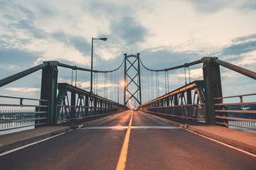 Fototapeta na wymiar Bridge view crossing Saint Lawrence river from Ile D'Orleans in Quebec