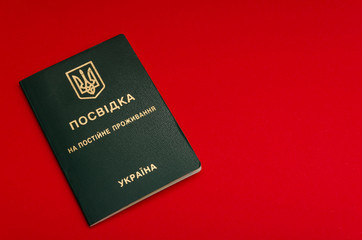 Residence permit in Ukraine. Red background