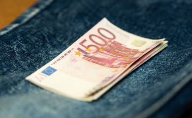 five hundred euros on a background of jeans