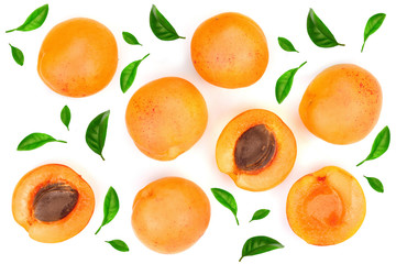 Apricot fruits with leaves isolated on white background. Top view. Flat lay pattern