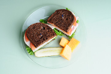 Black Forest Deli Sandwich with Fruit and Pickle