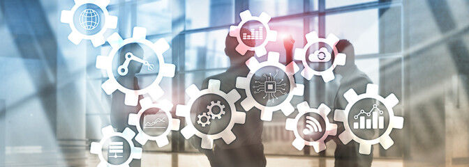 Automation technology and smart industry concept on blurred abstract background. Gears and icons.