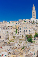 Fototapeta na wymiar The sassi of Matera, Italy and the bell tower of the Matera Cathedral