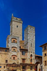 Fototapeta na wymiar Medieval towers and architecture of San Gimignano, Italy
