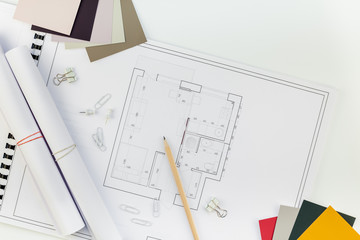 Naklejka na ściany i meble Interior designer table workplace with house plan