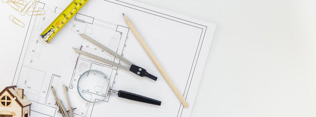 Interior designer table workplace with house plan