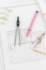 Interior designer table workplace with house plan
