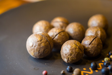 macadamia, Australian nut in a ceramic plate