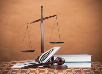 Book and wooden gavel, justice concept