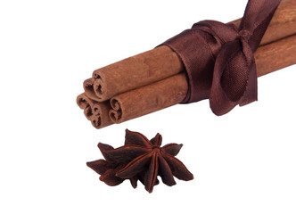 Cinnamon sticks with ribbon isolated on the white