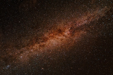Fototapeta na wymiar Milky way exposed in great detail and in brown reddish color