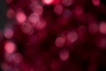 Color christmas red bokeh on dark background