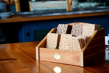 a stack of square Bread crackers