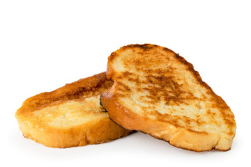Two slices of fried bread close up on a white. Isolated.