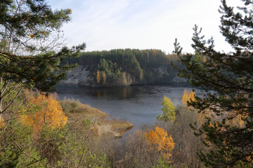 Picturesque autumn forest and pond of the Karelian village Girvas, Russia
