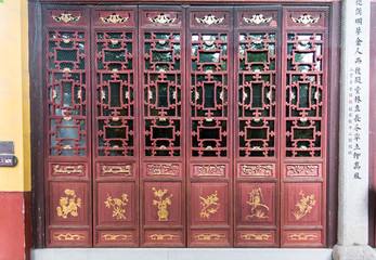 Wooden door panels at the Kaifu Temple, Changsha, China.