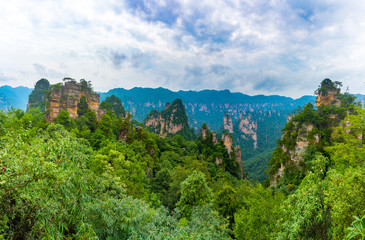 Fototapeta na wymiar Sandstone mountains viewed from the trail from the 10 Mile Natural Gallery to Tianzi Mountain. Wulingyuan Scenic Area, Zhangjiajie, Hunan, China.