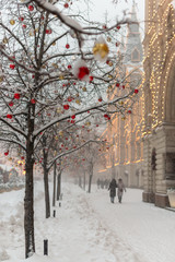 Streets of Moscow decorated for New Year and Christmas celebration. Tree with bright red and yellow balls. Russia