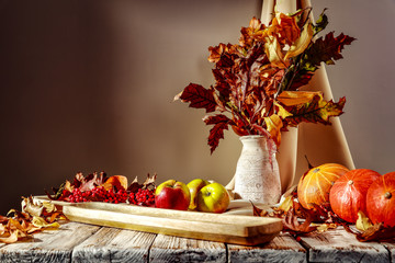 Autumnal table with free space for an advertising product  