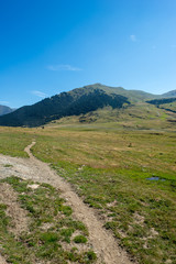 Fototapeta premium Mountains in Montgarri under blue sky, Valley of aran