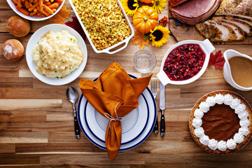 Thanksgiving table with turkey and sides