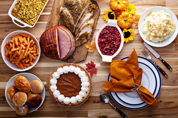 Thanksgiving table with turkey and sides