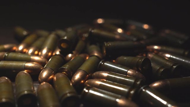 Close - up of the cartridges from the pistol. 4k