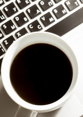 Breakfast with coffee and laptop