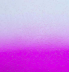purple bubbles in water close-up abstract background